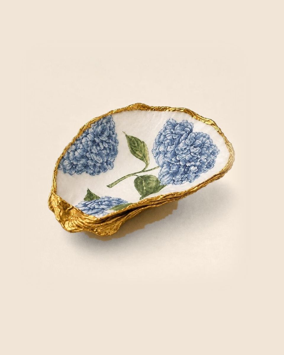 The Blue Hydrangea oyster shell dish with a gold leaf edge