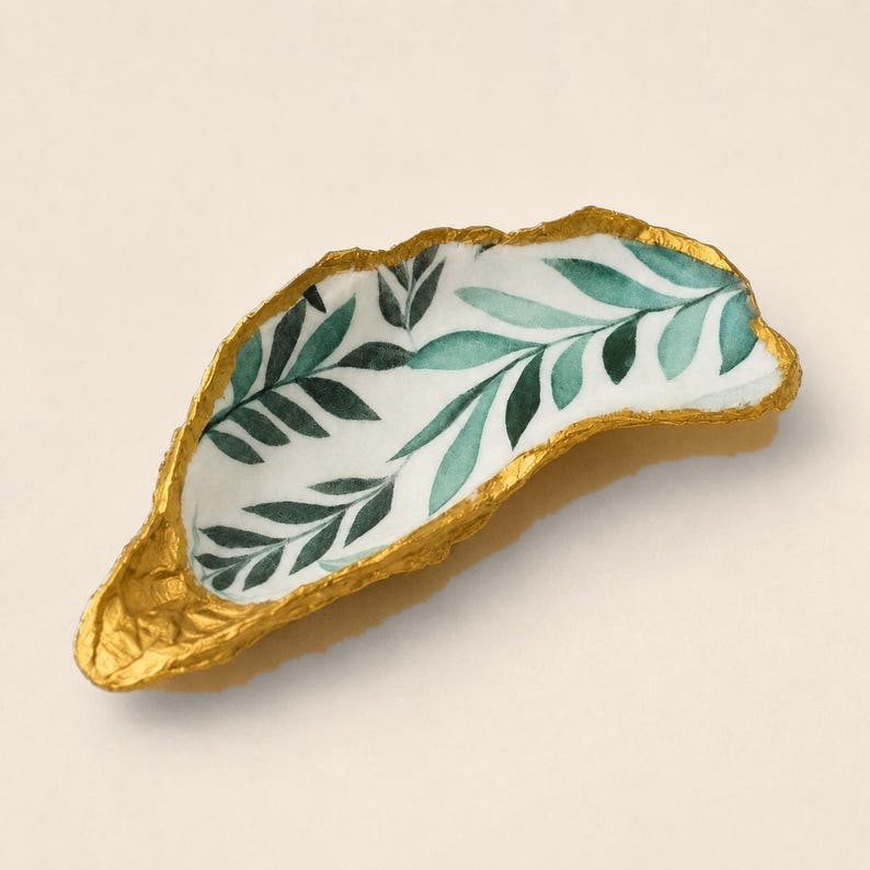 Green Leaf oyster shell ring dish with a gold leaf edge